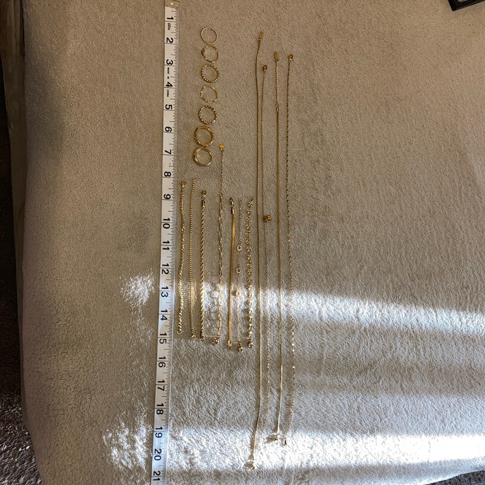 18 PIECES OF STAINLESS STEEL TARNISH FREE JEWELRY! FREE GIFT WITH PURCHASE!